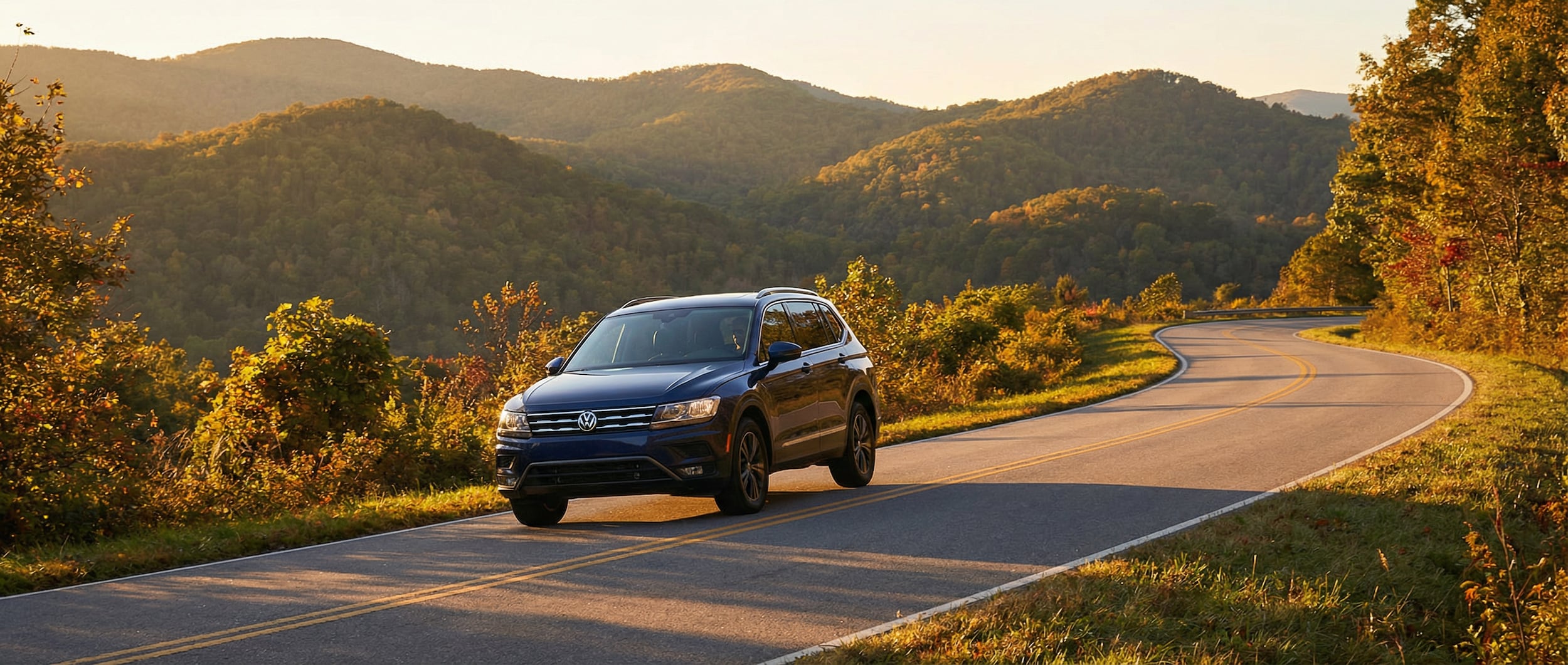 Volkswagen Tiguan driving efficiently on Upstate SC backroads near Greenville, SC