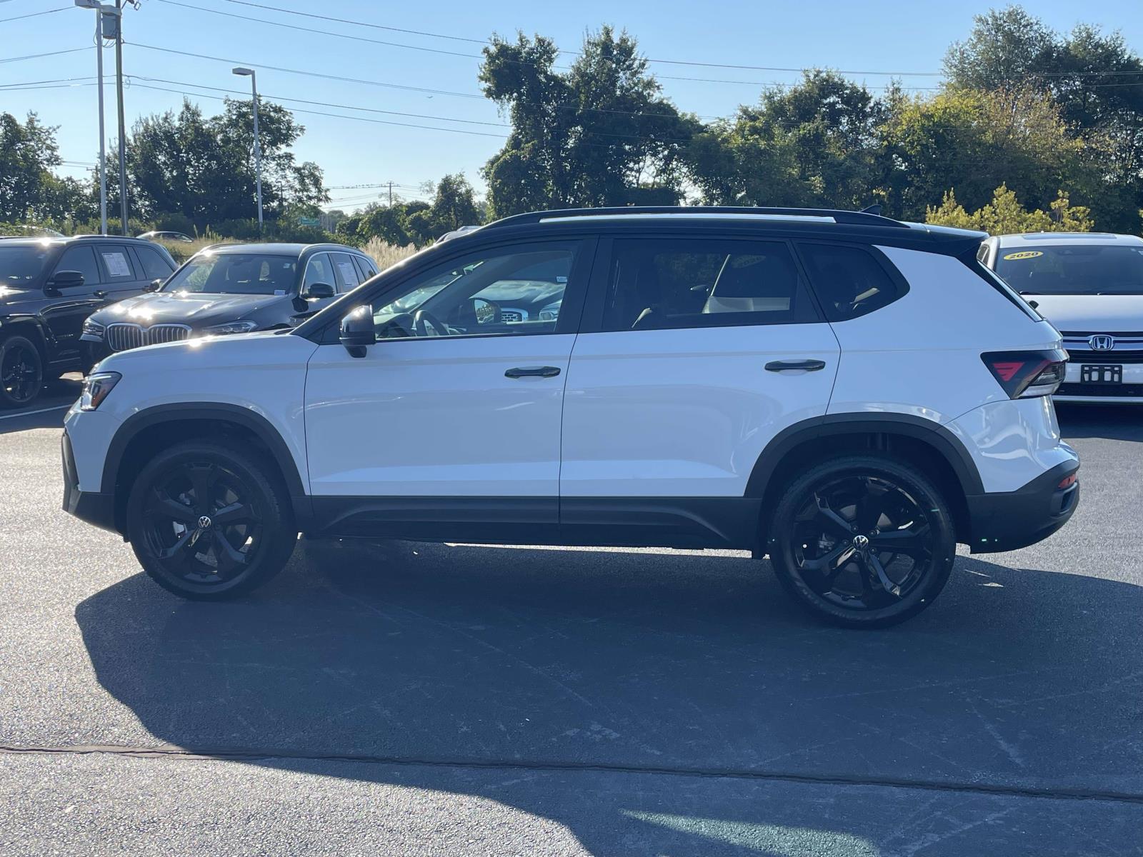 Certified 2026 Volkswagen Taos SE Black 4MOTION Sport Utility