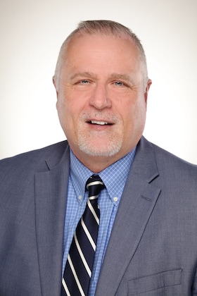 Staff member Shawn Evans from 2d1b0f9102a3