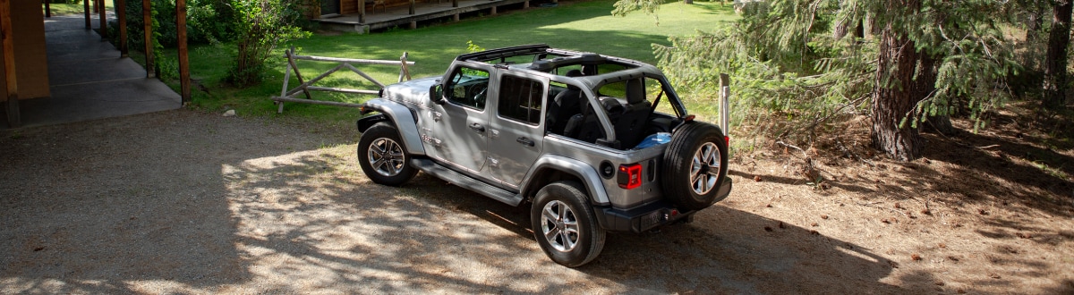 New Jeep Wangler outside a lake camp