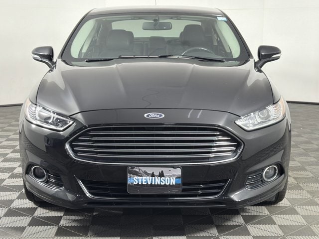 Used 2015 Ford Fusion Titanium with VIN 3FA6P0D97FR194524 for sale in Longmont, CO