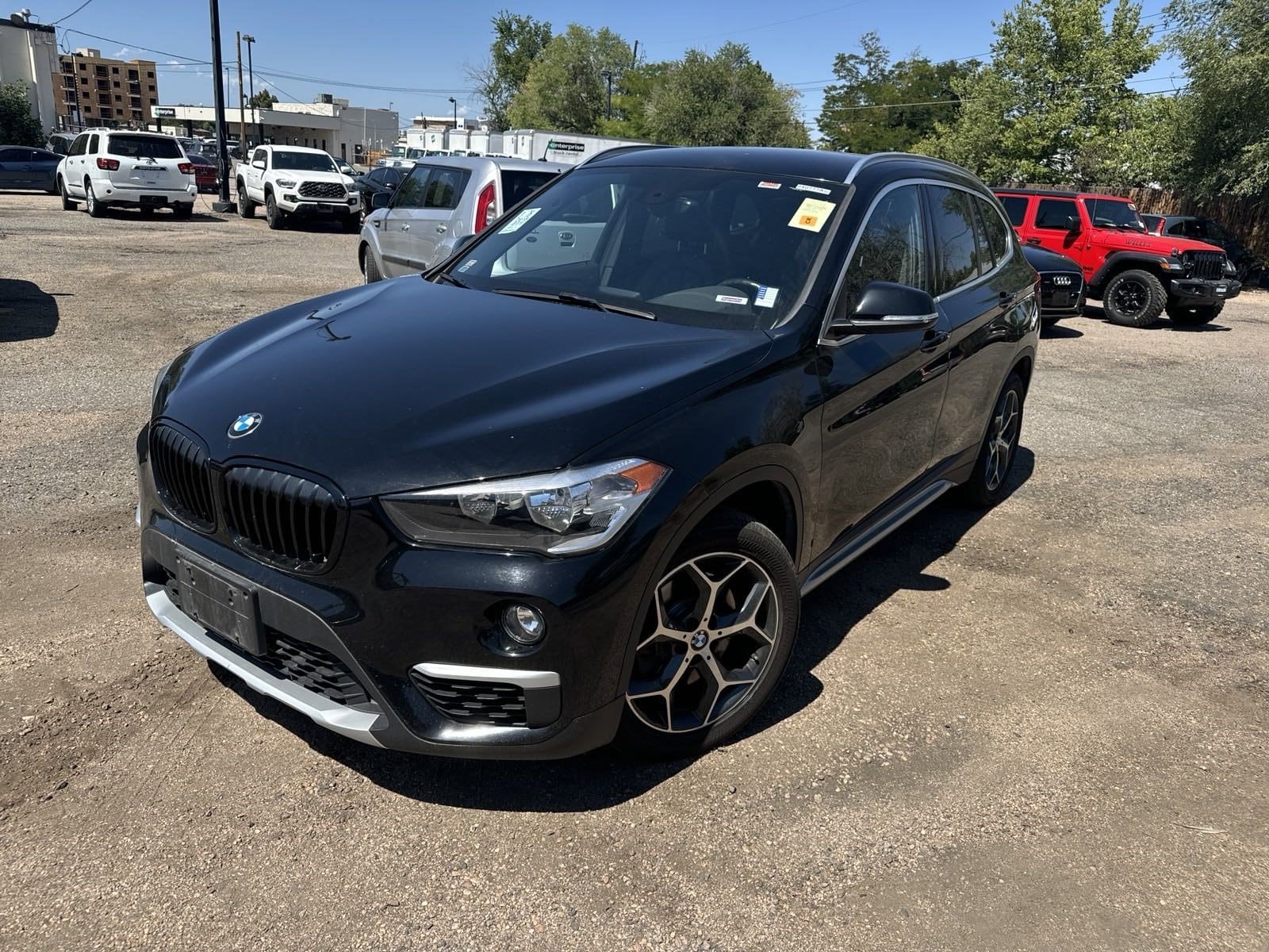 Used 2018 BMW X1 28i with VIN WBXHT3C33J5L26917 for sale in Aurora, CO