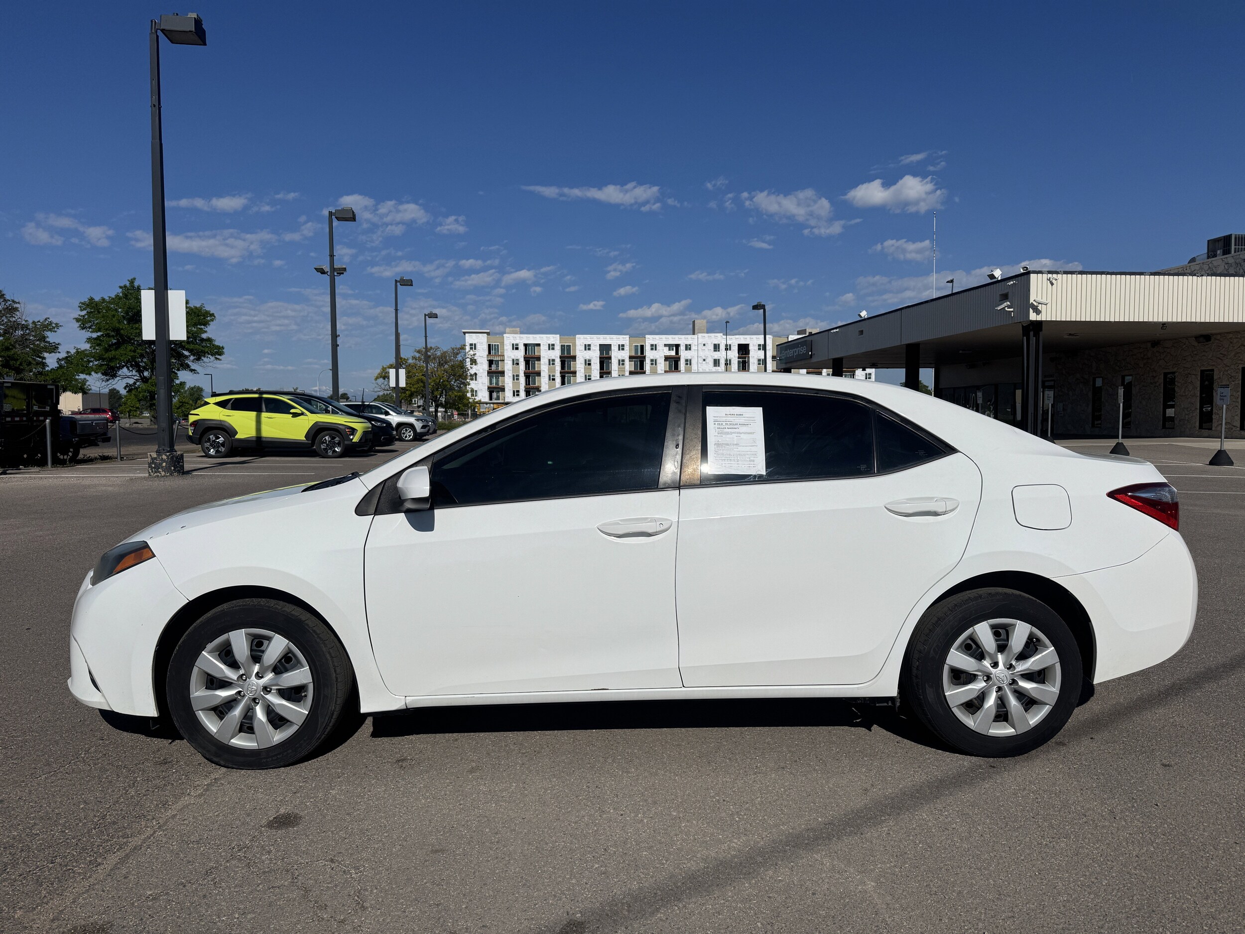 Used 2015 Toyota Corolla LE with VIN 5YFBURHE4FP236635 for sale in Aurora, CO