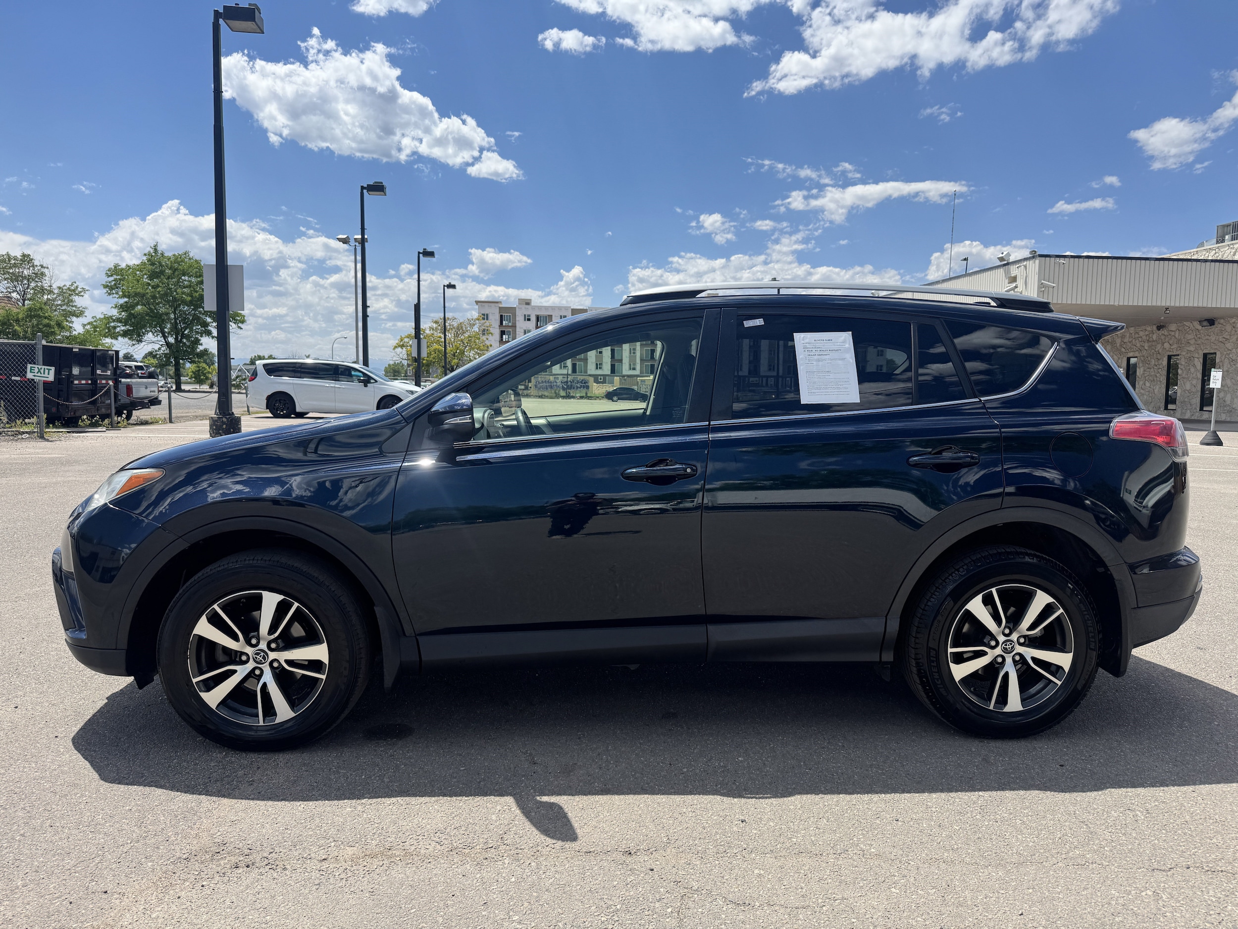 Used 2017 Toyota RAV4 XLE with VIN JTMRFREV9HD199035 for sale in Aurora, CO