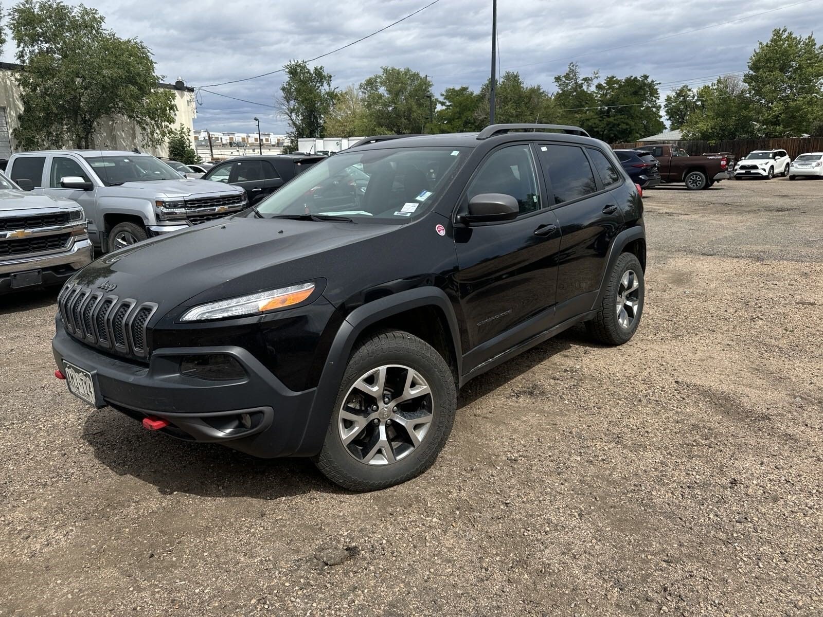 Used 2015 Jeep Cherokee Trailhawk with VIN 1C4PJMBSXFW513389 for sale in Aurora, CO