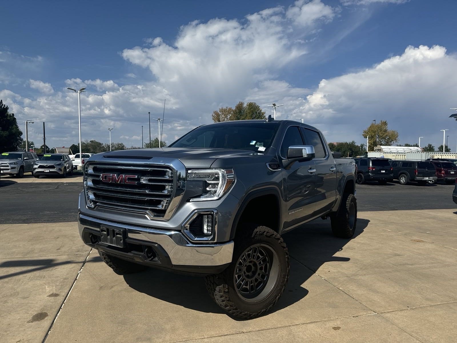 Used 2021 GMC Sierra 1500 SLT with VIN 3GTU9DET4MG386201 for sale in Aurora, CO