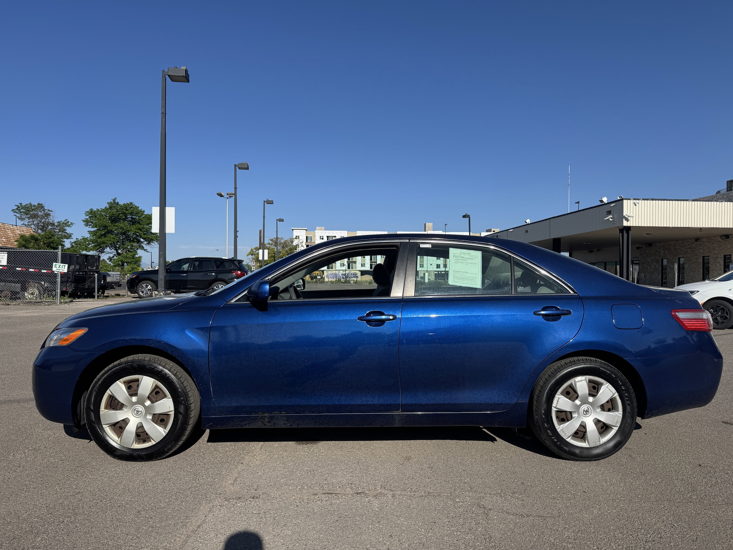 Used 2007 Toyota Camry LE with VIN 4T1BE46K67U087329 for sale in Aurora, CO