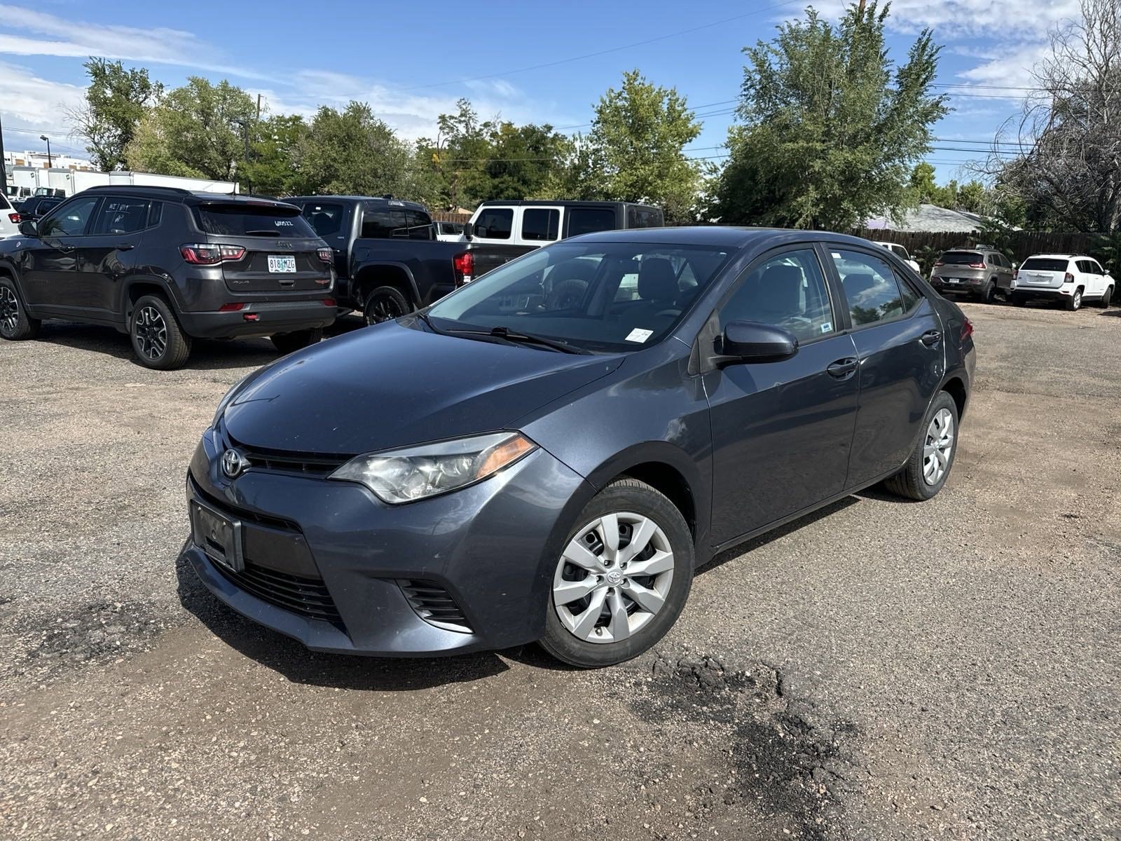 Used 2015 Toyota Corolla LE with VIN 5YFBURHE1FP330052 for sale in Aurora, CO