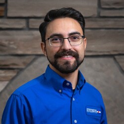 Staff member Roman Tafoya from ID_5658b41f48e4