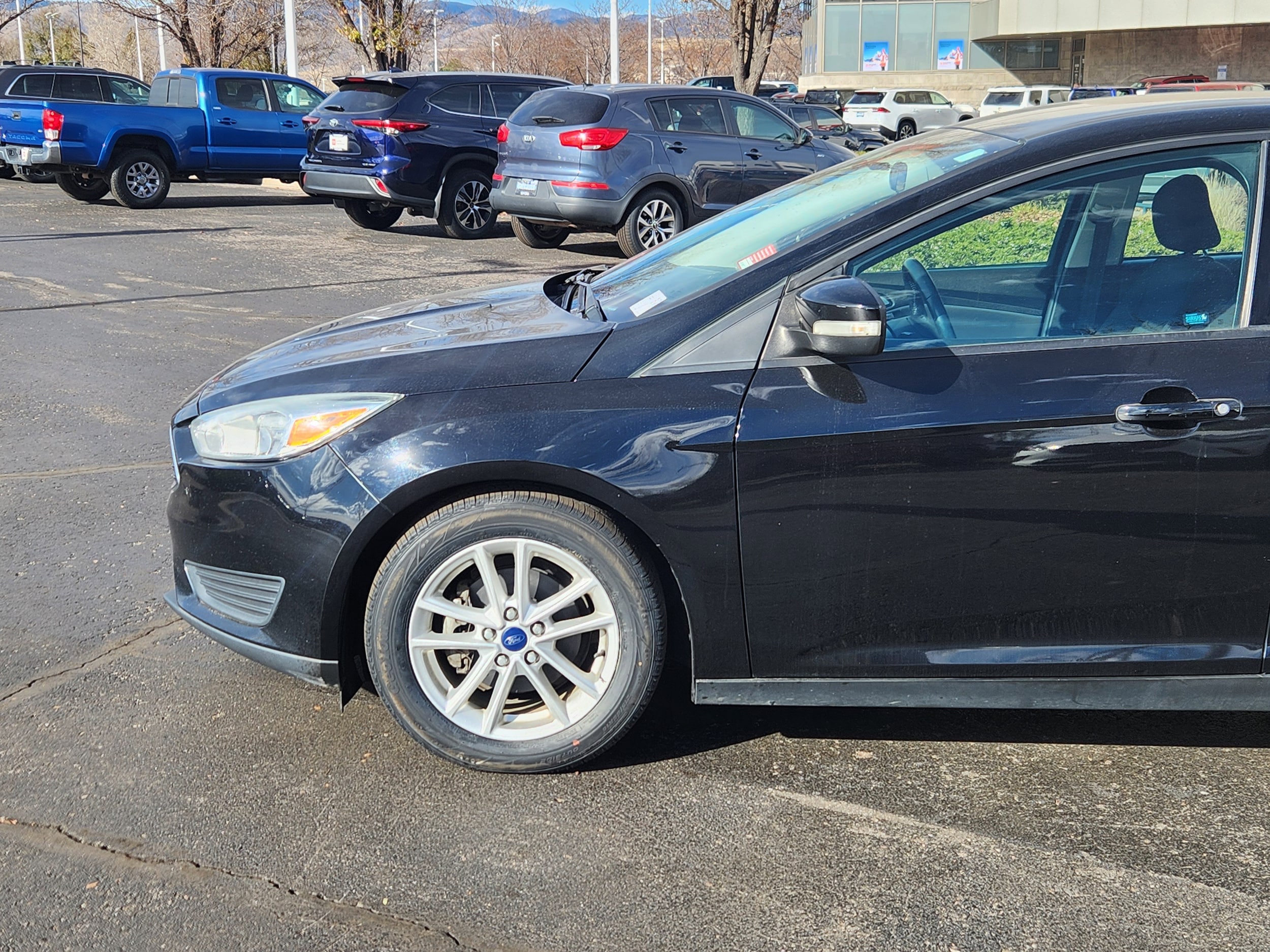 Used 2016 Ford Focus SE with VIN 1FADP3F21GL281909 for sale in Lakewood, CO