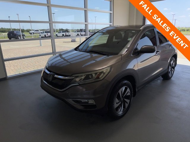 Used 2016 Honda CR-V Touring with VIN 5J6RM3H99GL006057 for sale in Corsicana, TX