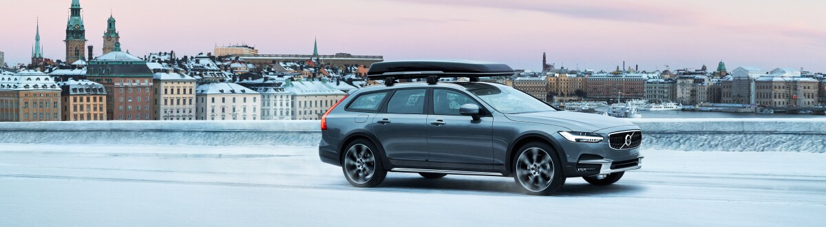 New Volvo V90 Cross Country sitting above the city