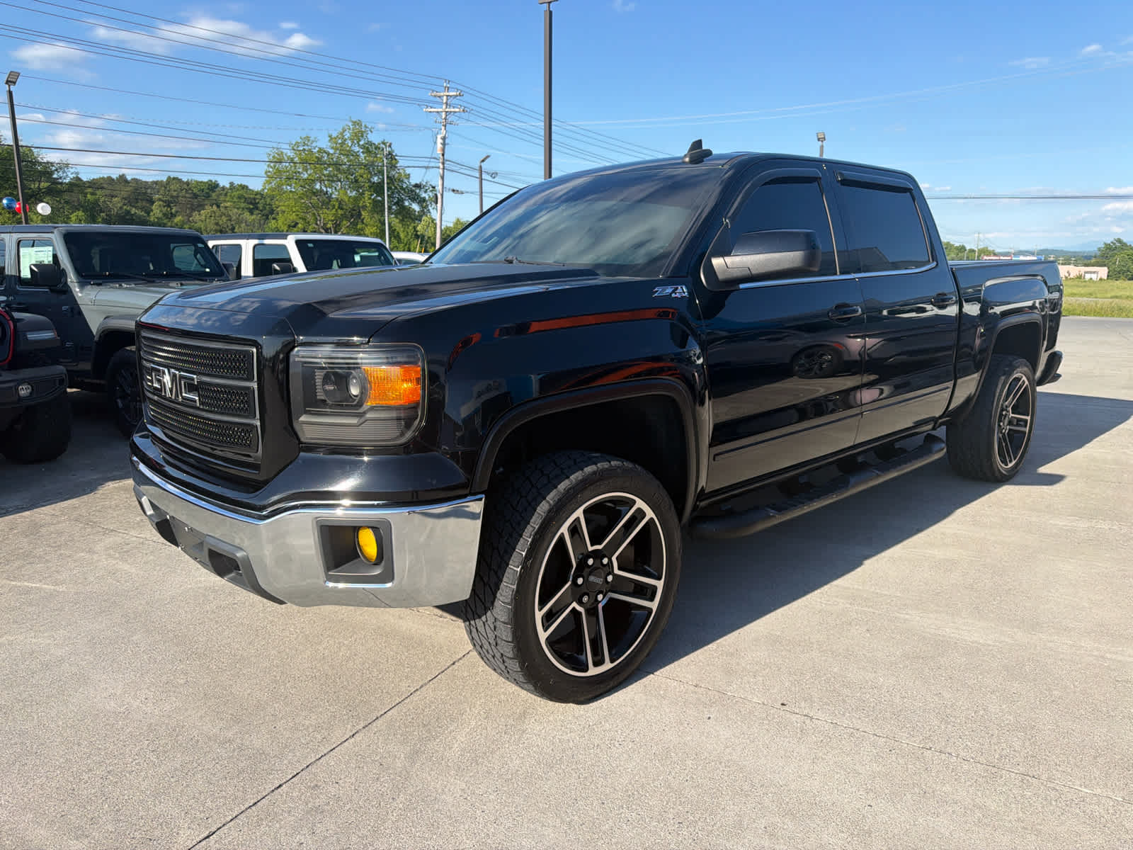 2015 GMC Sierra 4WD Crew Cab SLE SWB's photo