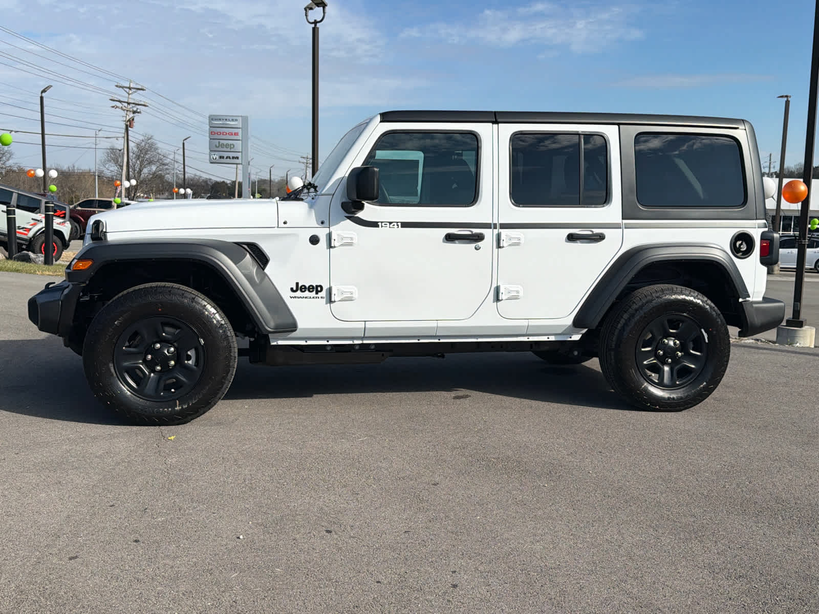 2026 Jeep Wrangler 4-Door Sport's photo