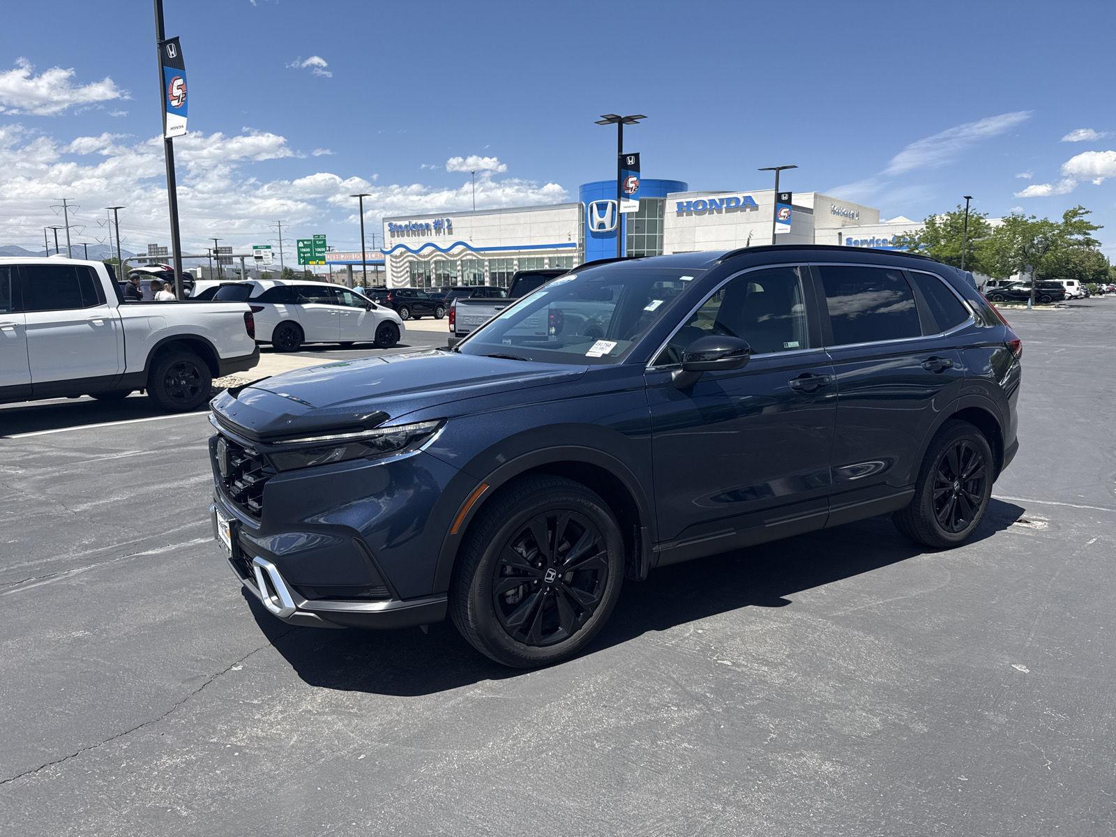 2023 Honda CR-V Hybrid Sport Touring AWD's photo