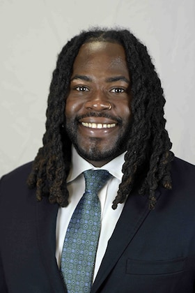 Staff member Isaiah Hinton from ID_7cf6ab9e6e90