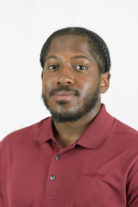 Staff member Jean Mundele from ID_9706c7e4bec0