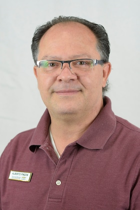 Staff member Alberto Pinzon from ID_9706c7e4bec0
