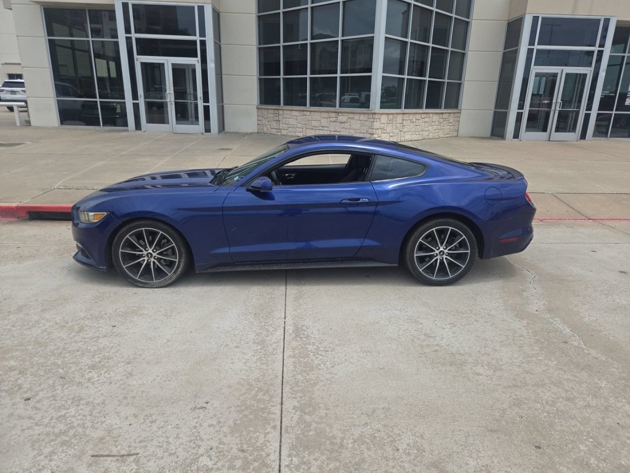Used 2015 Ford Mustang EcoBoost with VIN 1FA6P8TH6F5375382 for sale in Frisco, TX