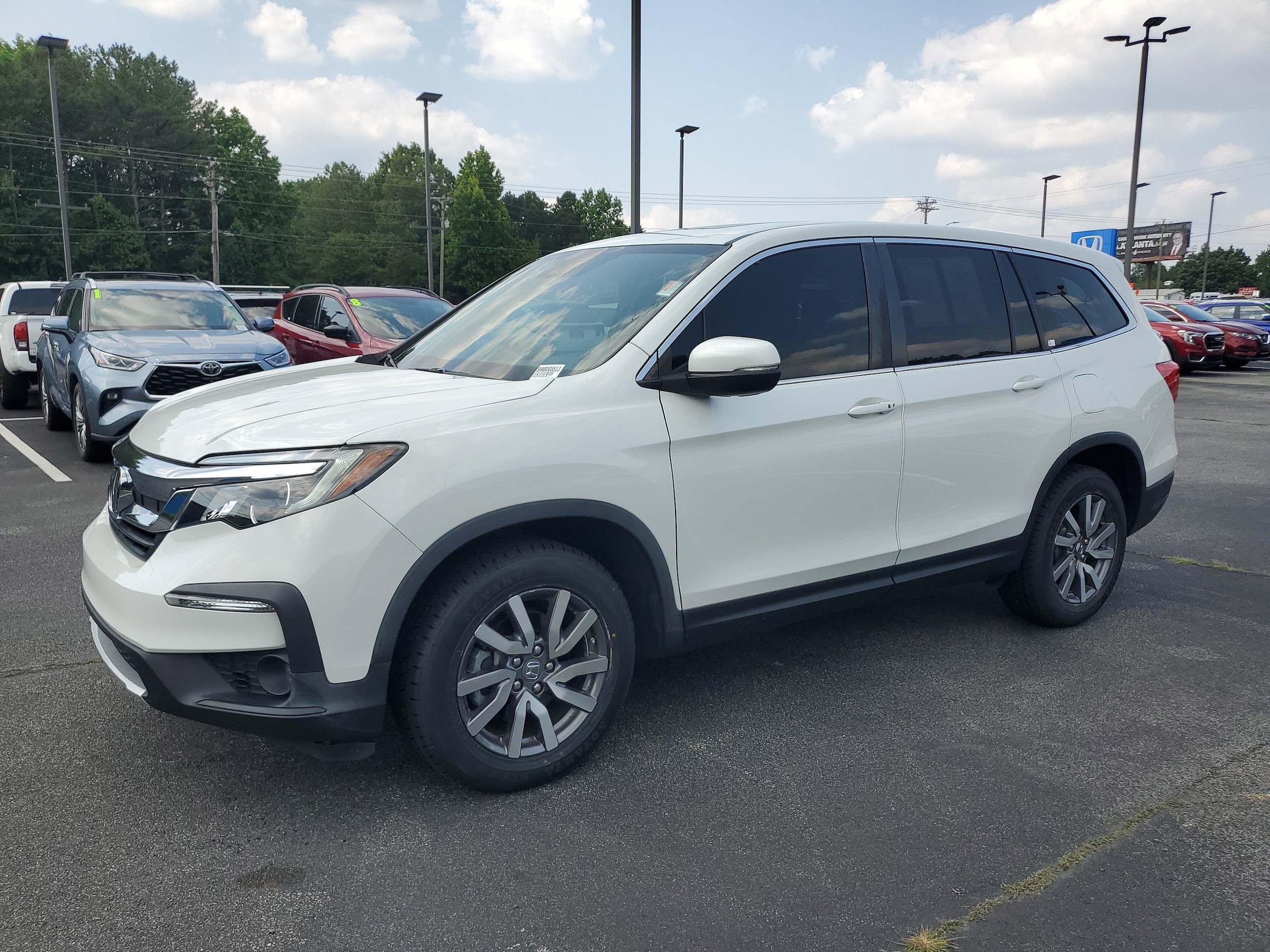 Used 2022 Honda Pilot EX-L with VIN 5FNYF5H52NB008513 for sale in Snellville, GA