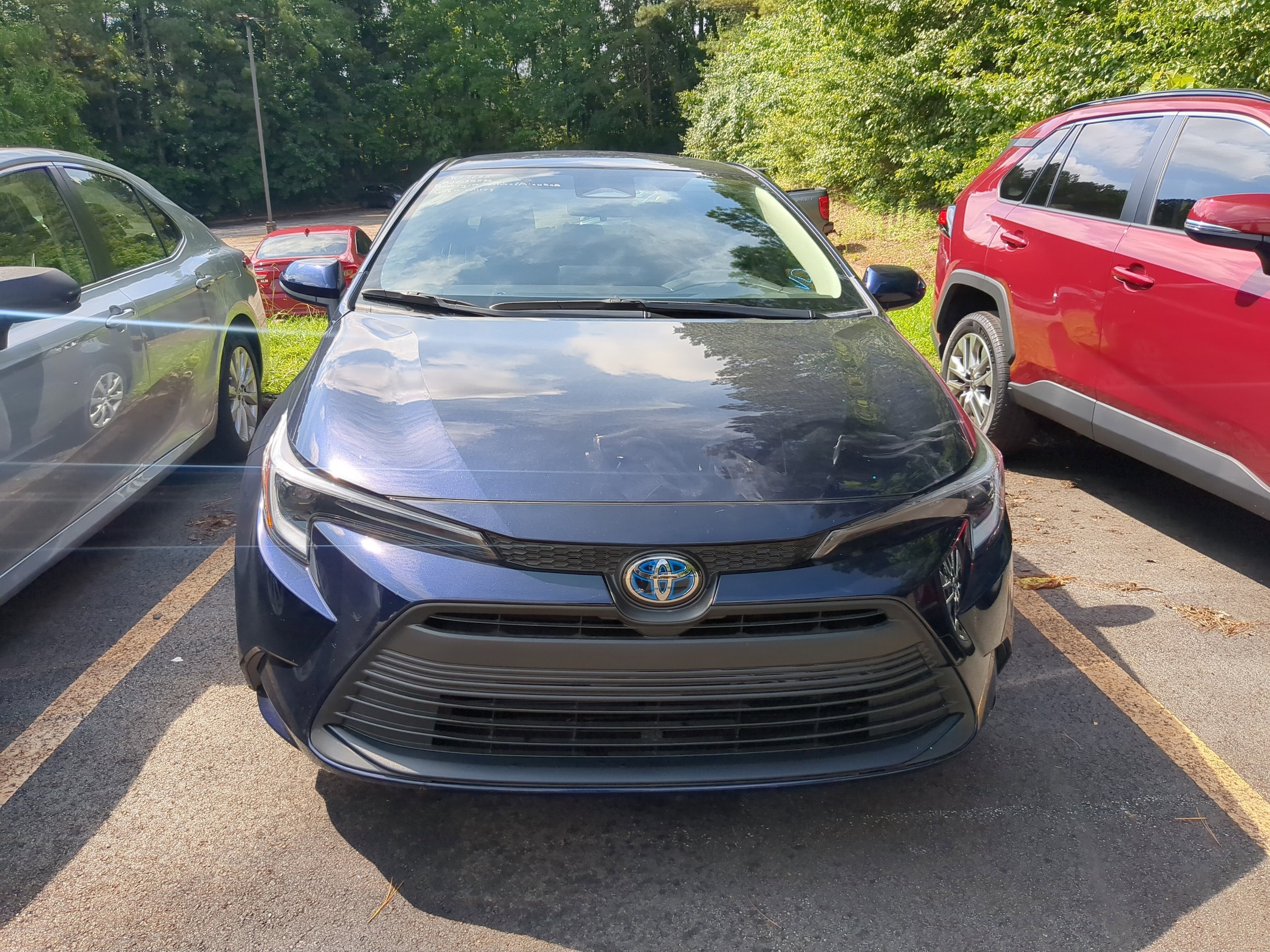 Used 2024 Toyota Corolla LE with VIN JTDBCMFEXRJ035582 for sale in Snellville, GA