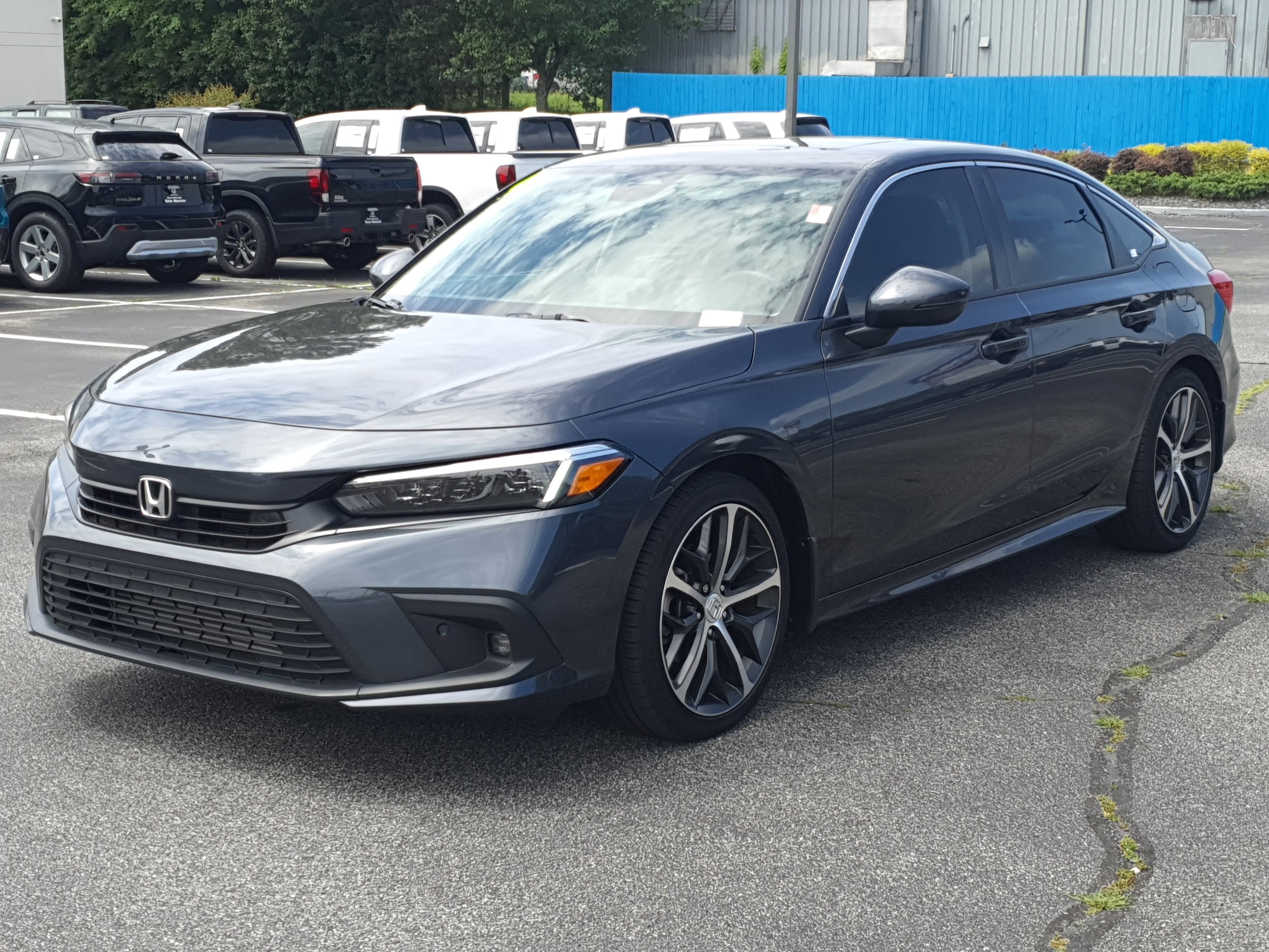 Used 2024 Honda Civic Touring with VIN 2HGFE1F9XRH310769 for sale in Snellville, GA