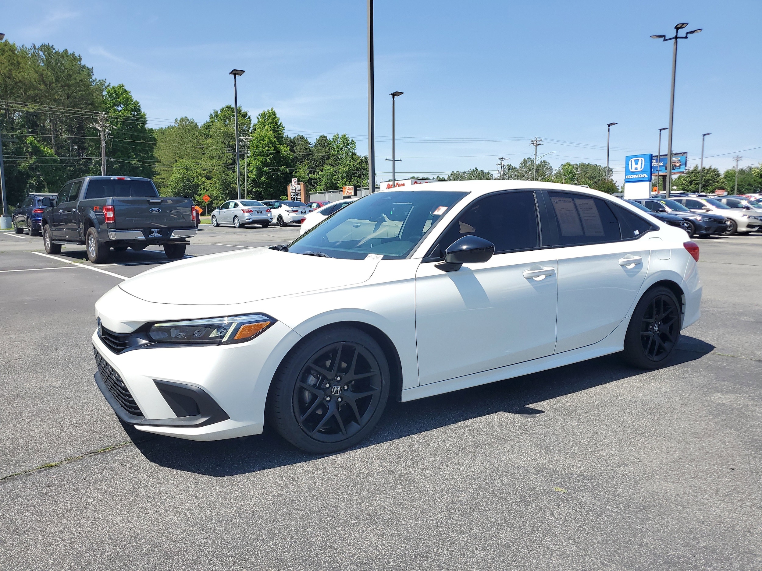 Used 2023 Honda Civic Sport with VIN 2HGFE2F51PH510990 for sale in Snellville, GA