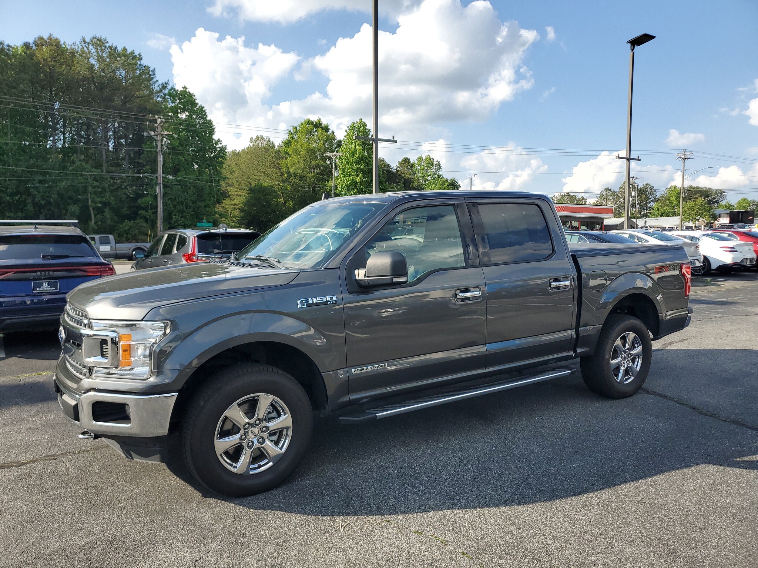 Used 2019 Ford F-150 XLT with VIN 1FTEW1E11KFD48708 for sale in Snellville, GA