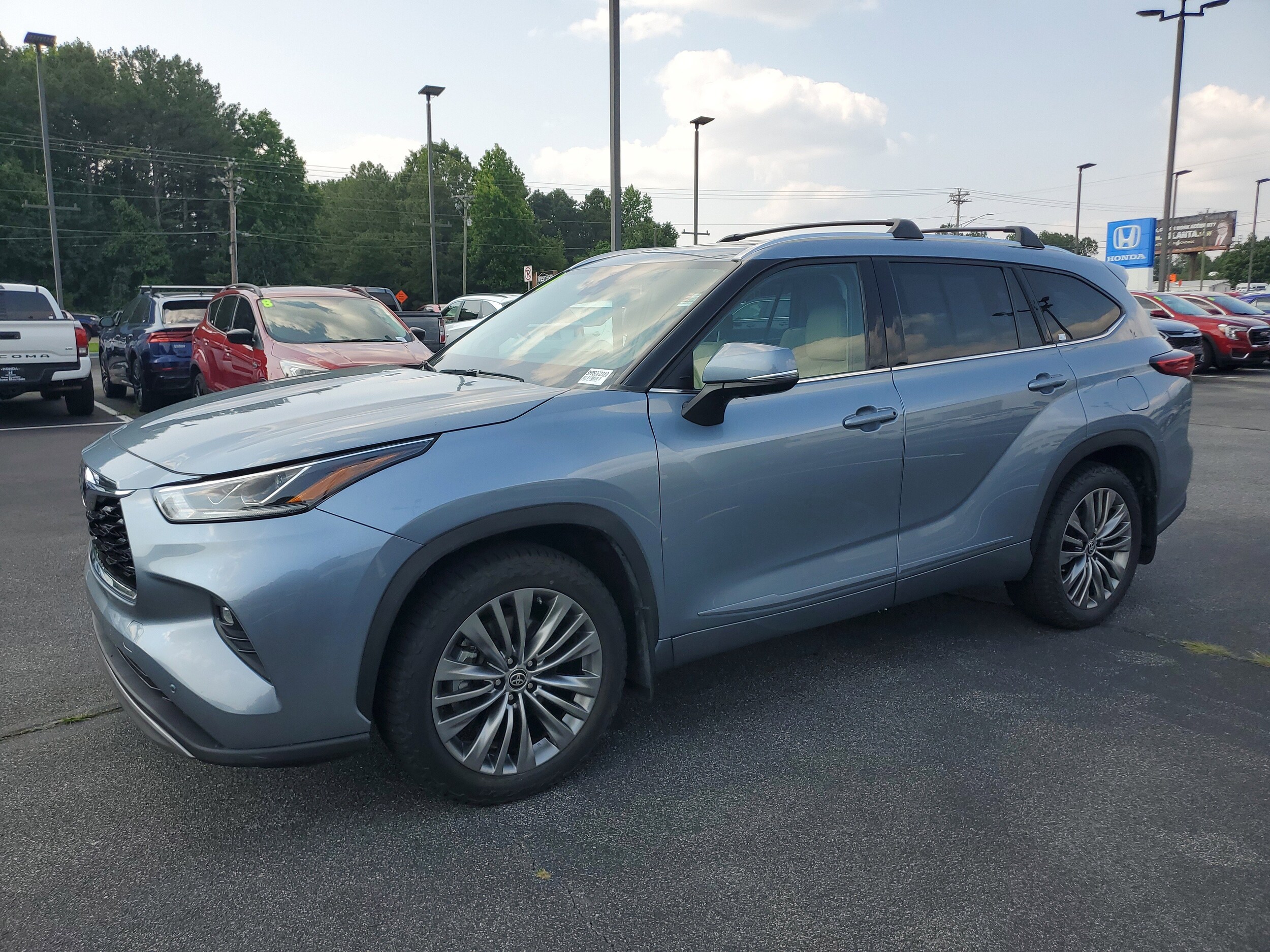 Used 2021 Toyota Highlander Platinum with VIN 5TDFZRBH7MS072310 for sale in Snellville, GA
