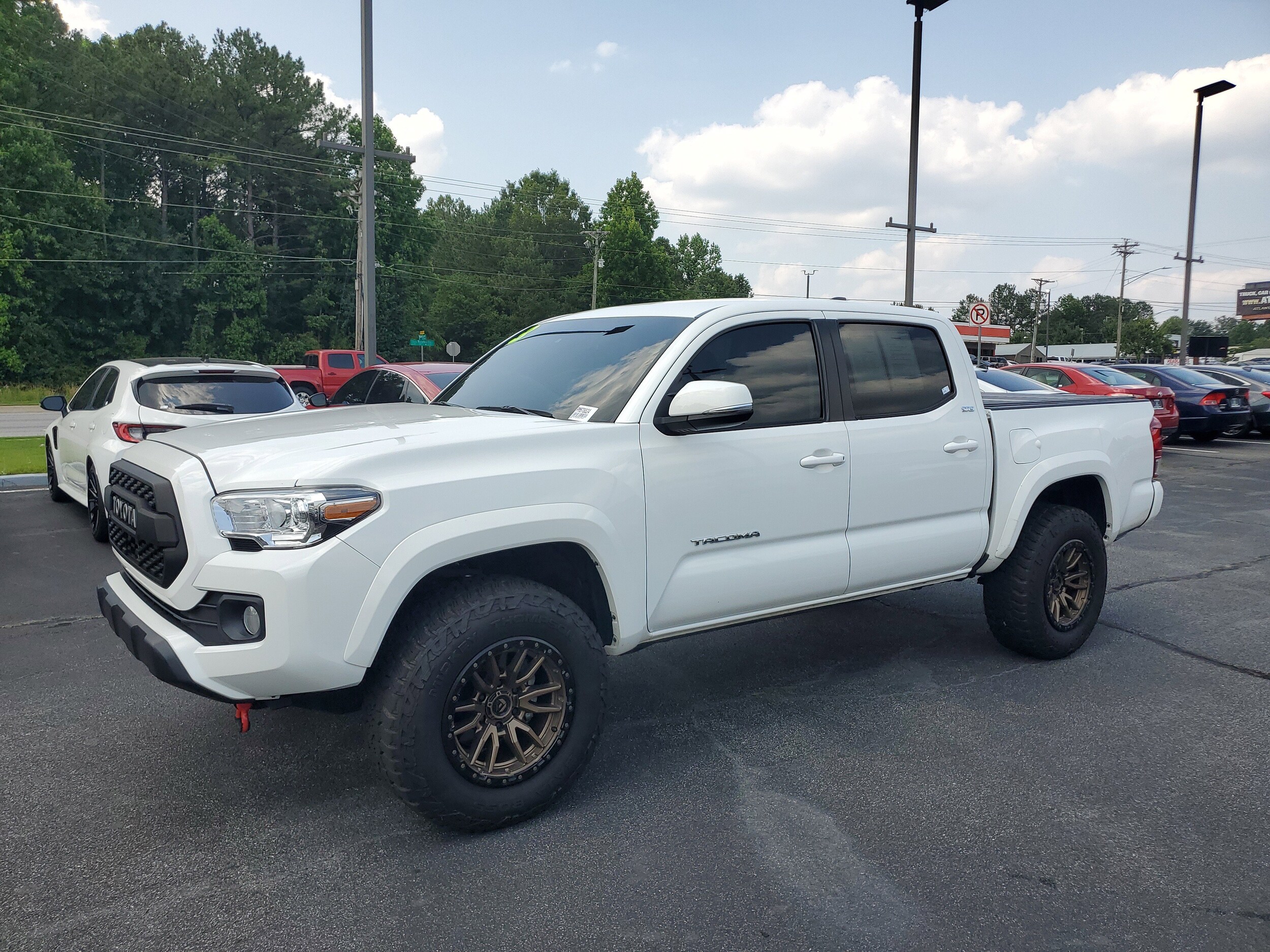 Used 2023 Toyota Tacoma SR5 with VIN 3TMCZ5AN5PM578824 for sale in Snellville, GA
