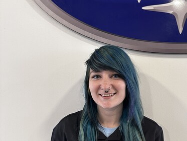 Staff member Kayla Drake from 8057d824cc96