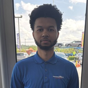 Staff member Elijah Singh from 067067d78ec2