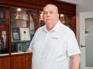Staff member John Collins from 7f6108171662