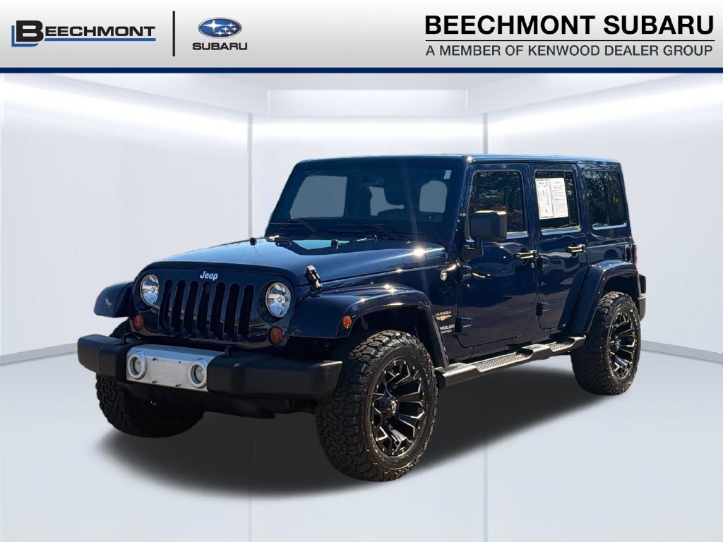 Used 2013 Jeep Wrangler Unlimited Sahara SUV