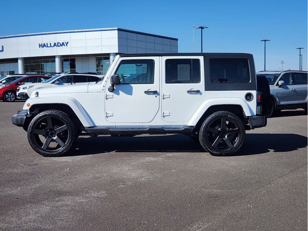 Used 2017 Jeep Wrangler Unlimited Sahara with VIN 1C4BJWEGXHL523194 for sale in Cheyenne, WY