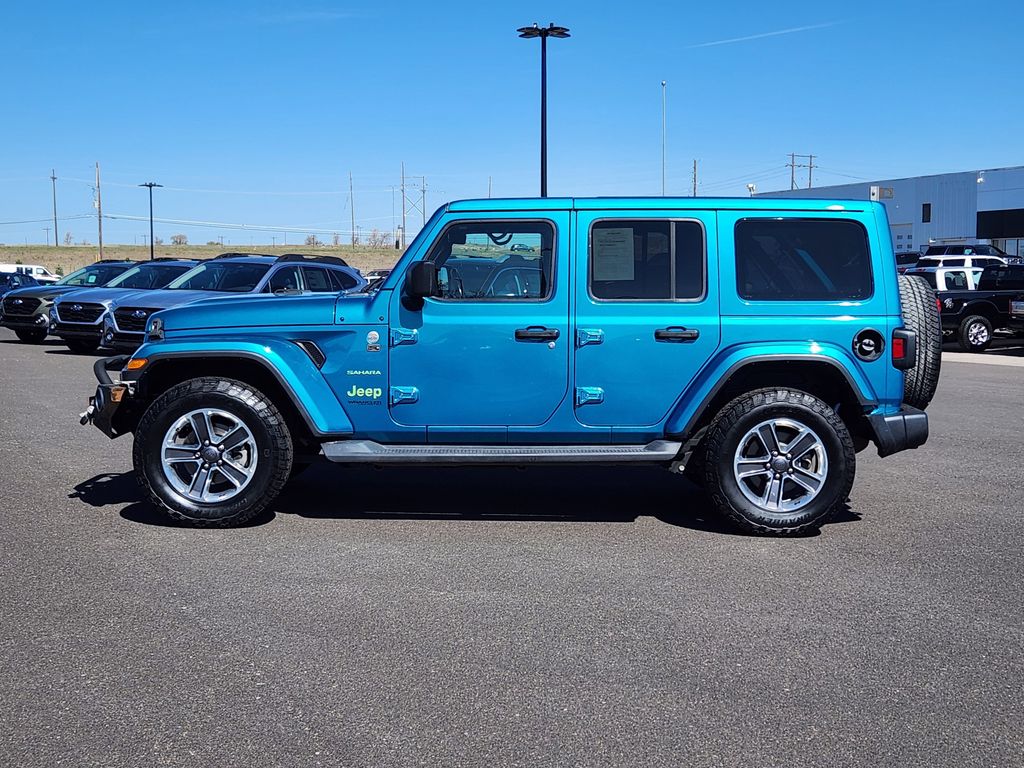 Used 2019 Jeep Wrangler Unlimited Sahara with VIN 1C4HJXEG7KW630158 for sale in Cheyenne, WY