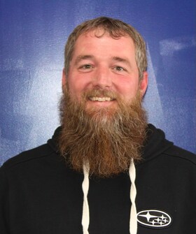 Staff member Aaron Scrivner from ID_2d23fc7fa654