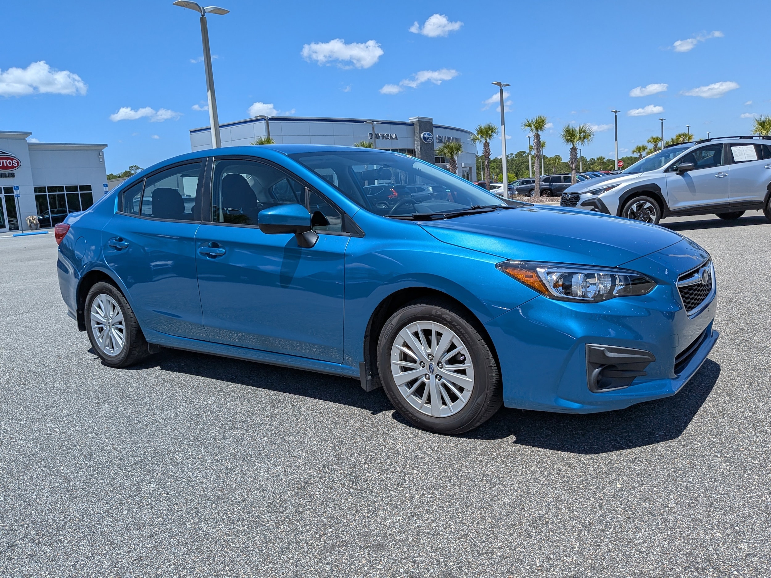 Used 2018 Subaru Impreza Premium with VIN 4S3GKAB69J3621947 for sale in Daytona Beach, FL