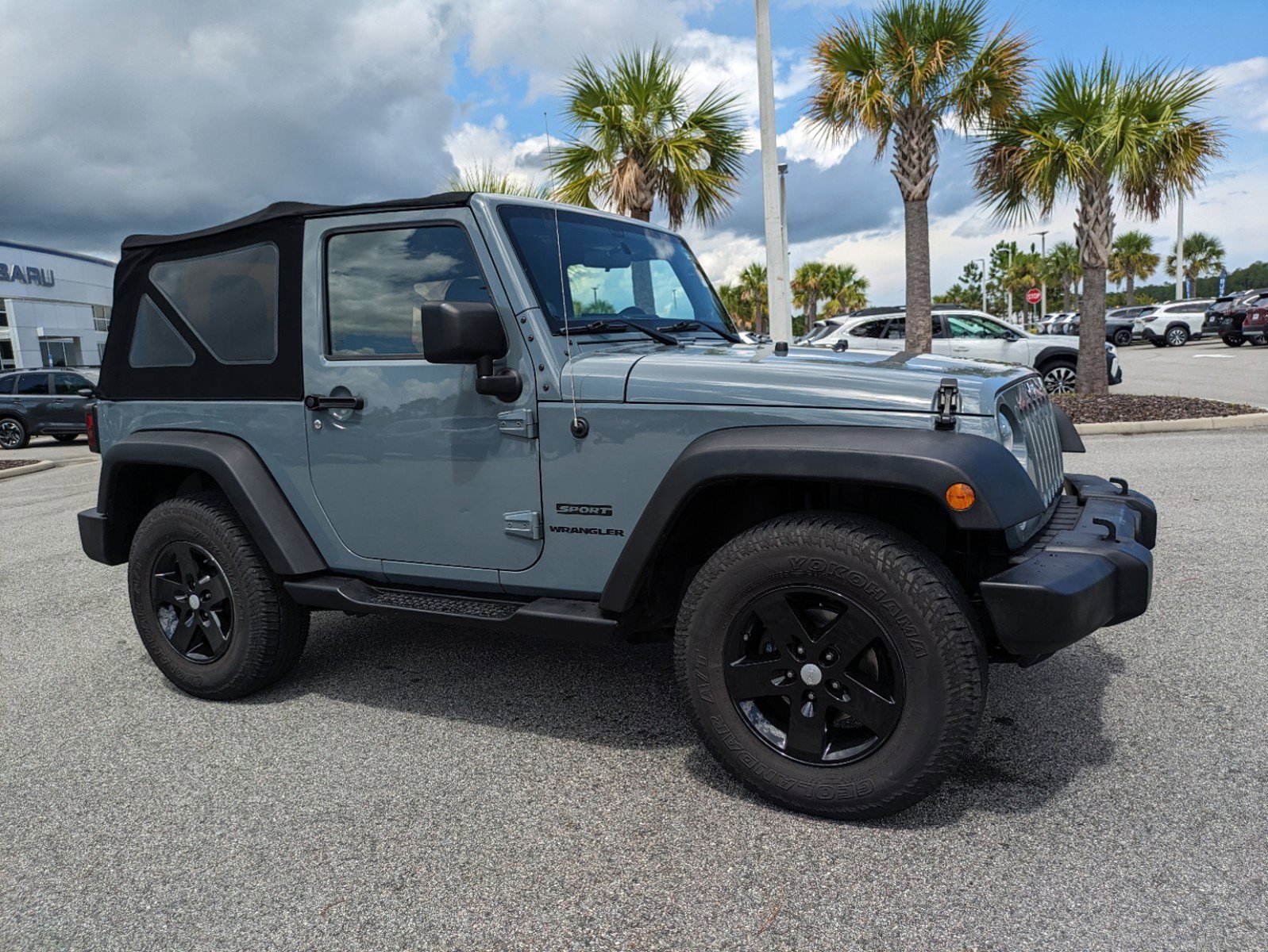 Used 2014 Jeep Wrangler Sport with VIN 1C4AJWAG5EL227397 for sale in Daytona Beach, FL