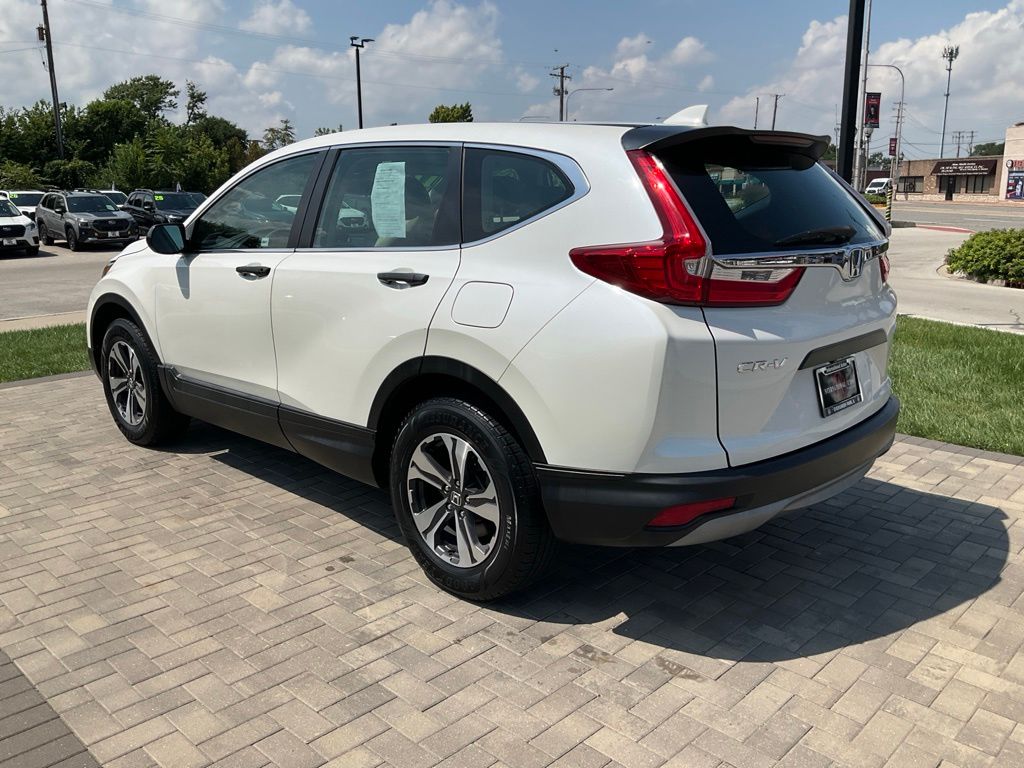 Used 2017 Honda CR-V LX with VIN 5J6RW6H30HL005081 for sale in Evergreen Park, IL