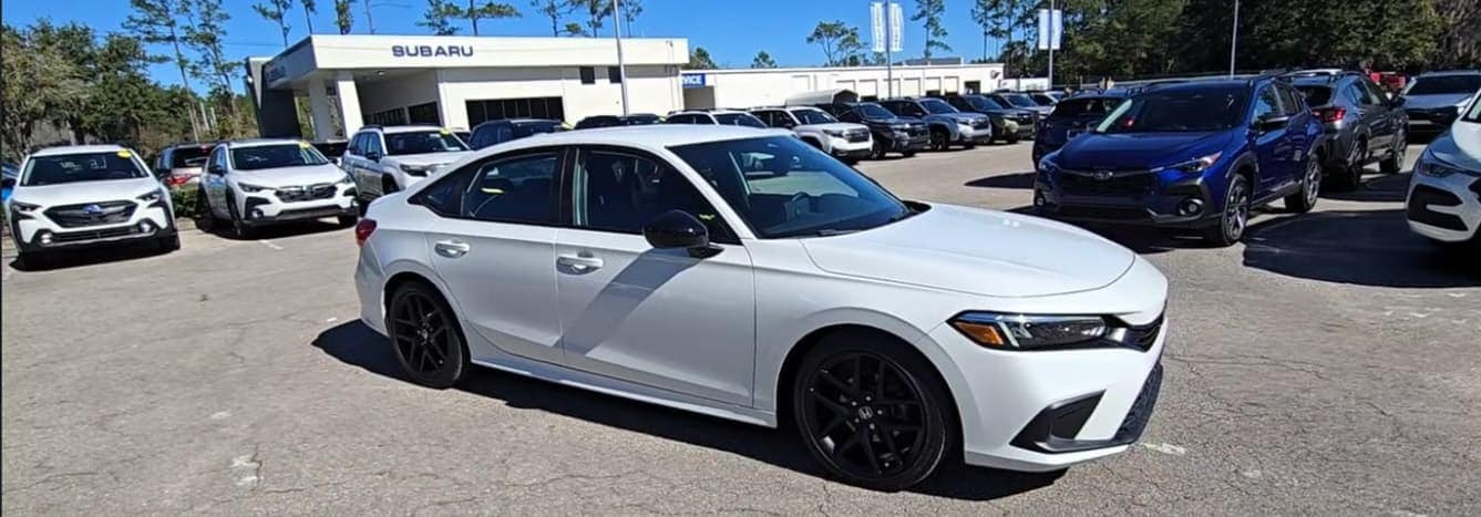 Find Used Hondas like this 2022 pre-owned Honda Civic photographed on our dealer lot in Gainesville, FL