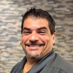 Staff member Carlos Otero from f3d1fbee9bf4