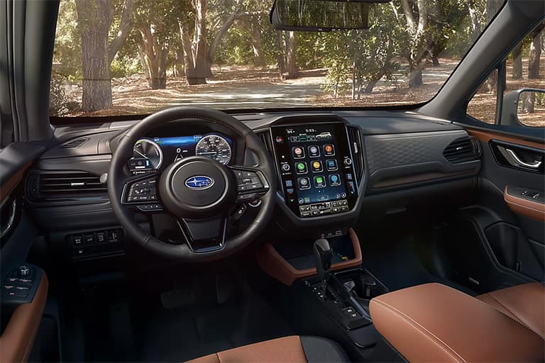 2026 Forester Touring Hybrid with standard AWD and interior features and space designed for active familes.