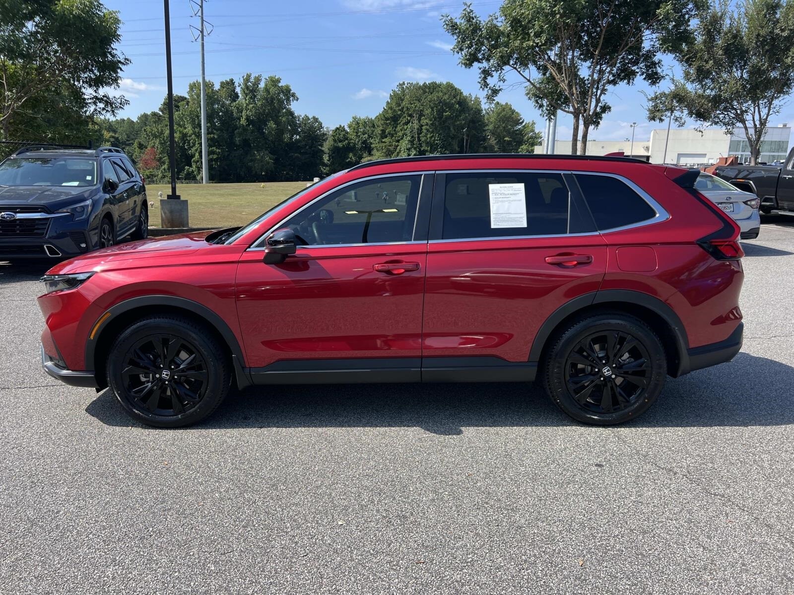 2023 Honda CR-V Hybrid Sport Touring photo 2