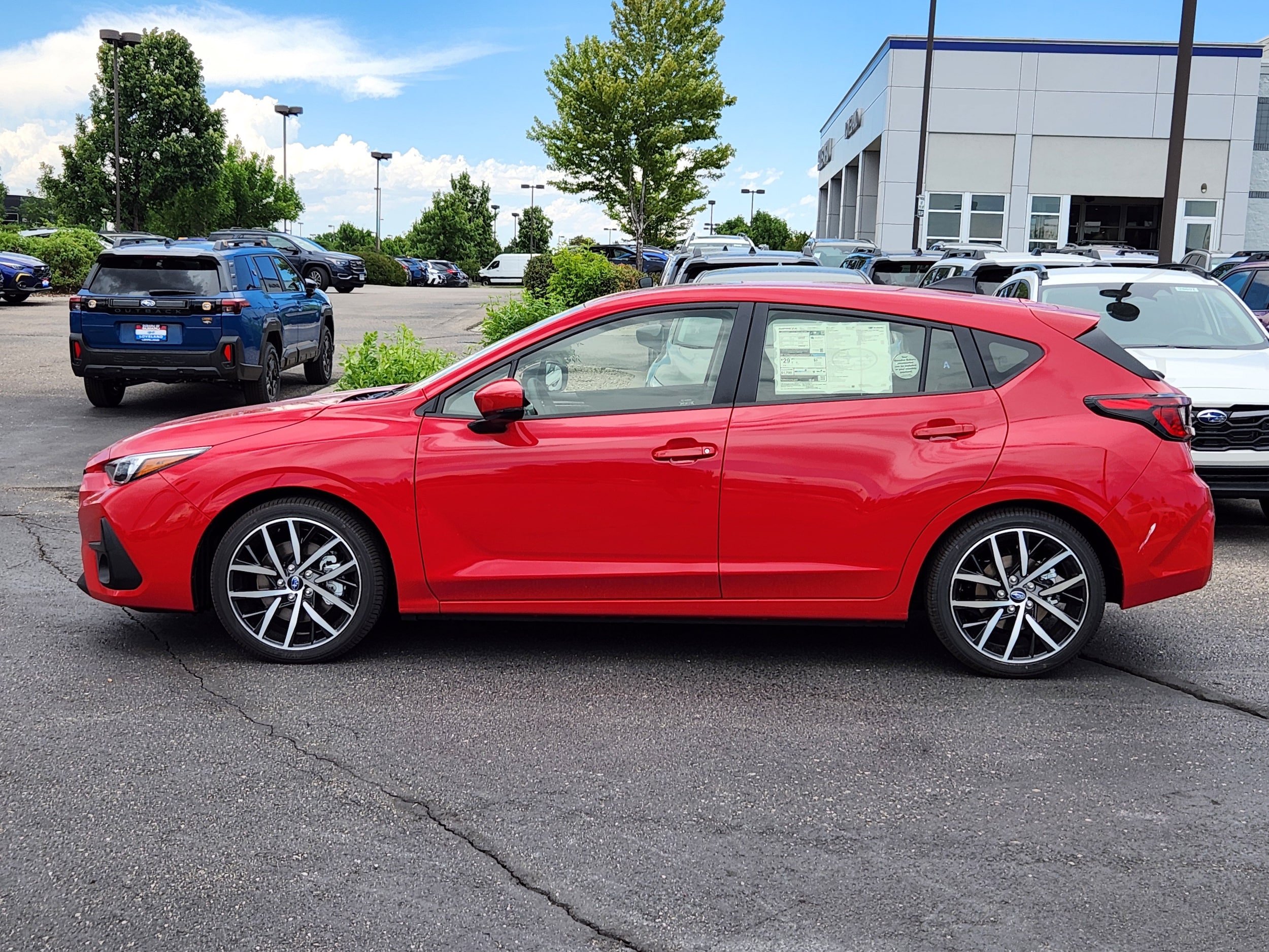 Red 2026 Subaru Impreza Wagon All-Wheel Drive Continuously Variable Transmission