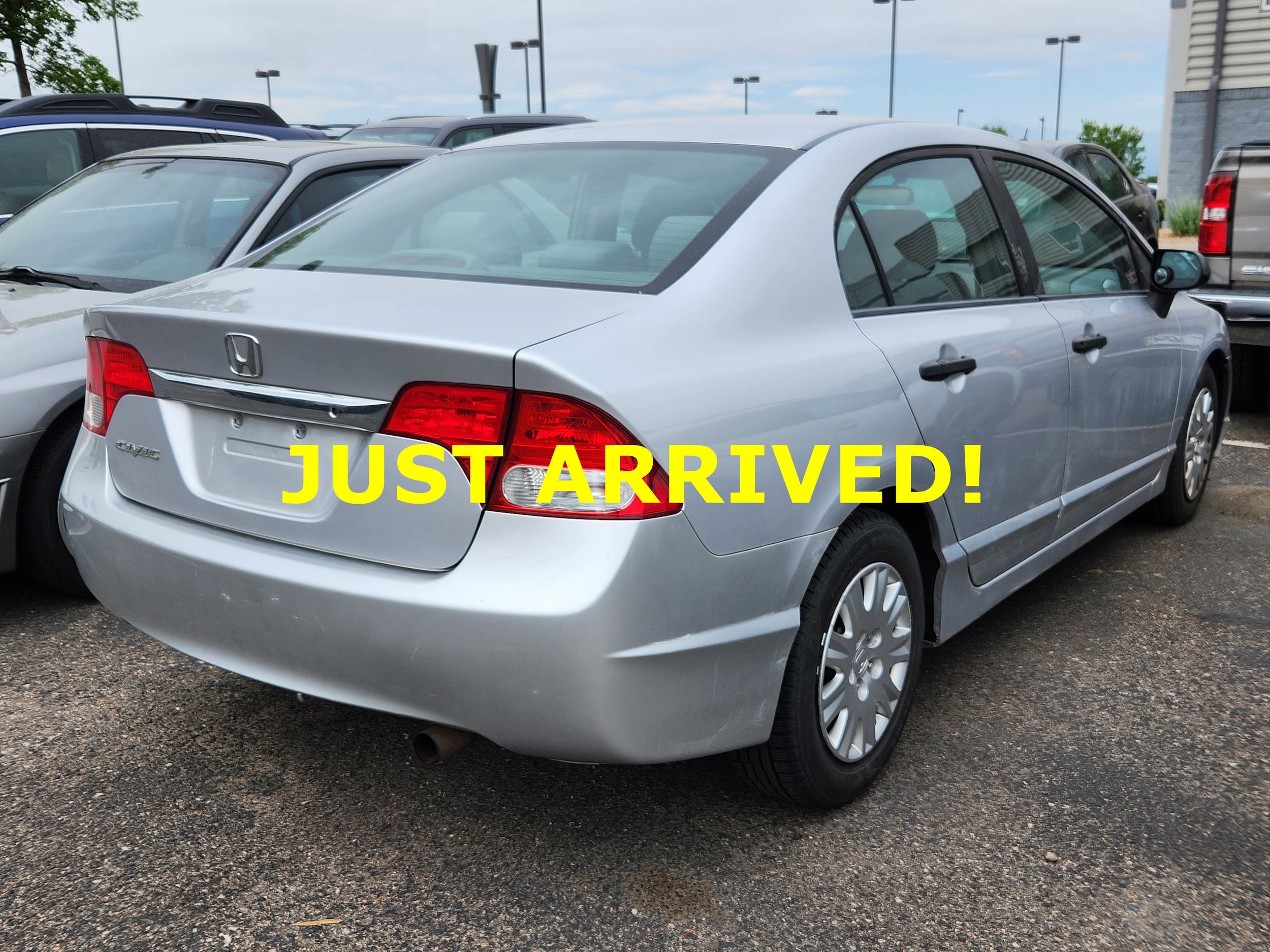 Silver 2011 Honda Civic DX-VP Sedan Front-Wheel Drive 5-Speed Automatic