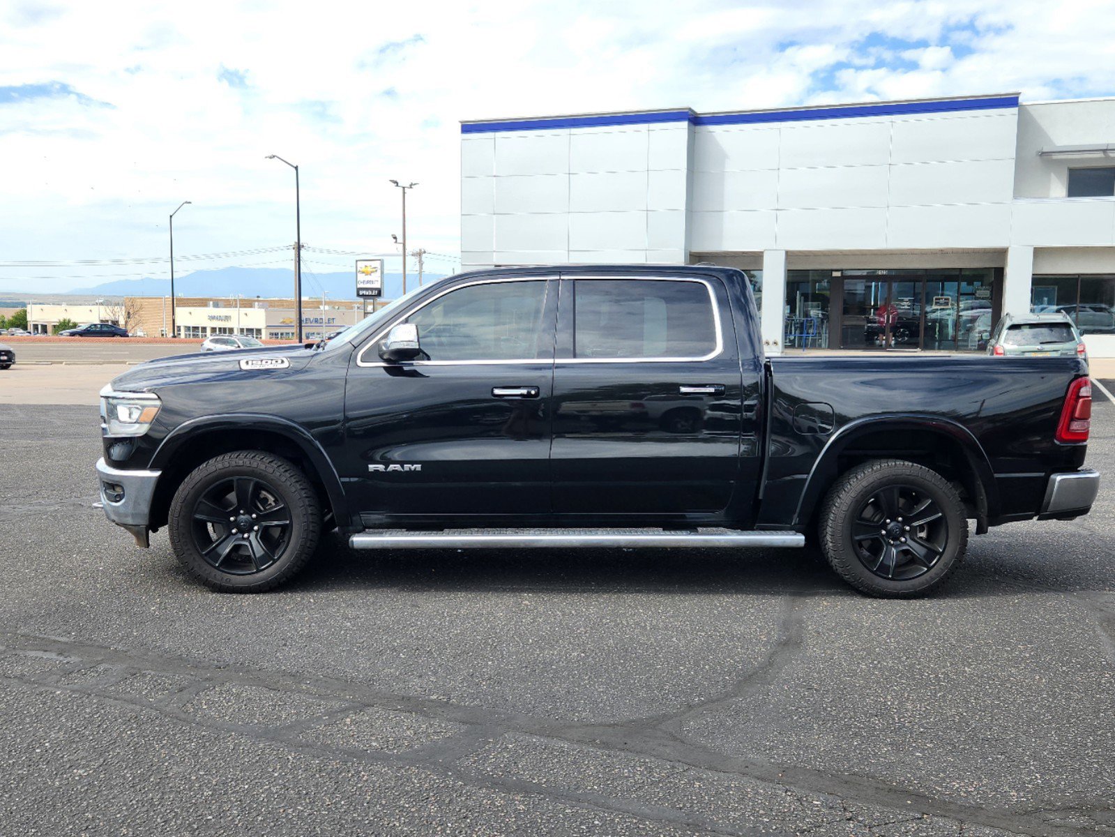 Used 2019 RAM Ram 1500 Pickup Laramie with VIN 1C6SRFJTXKN521640 for sale in Pueblo, CO