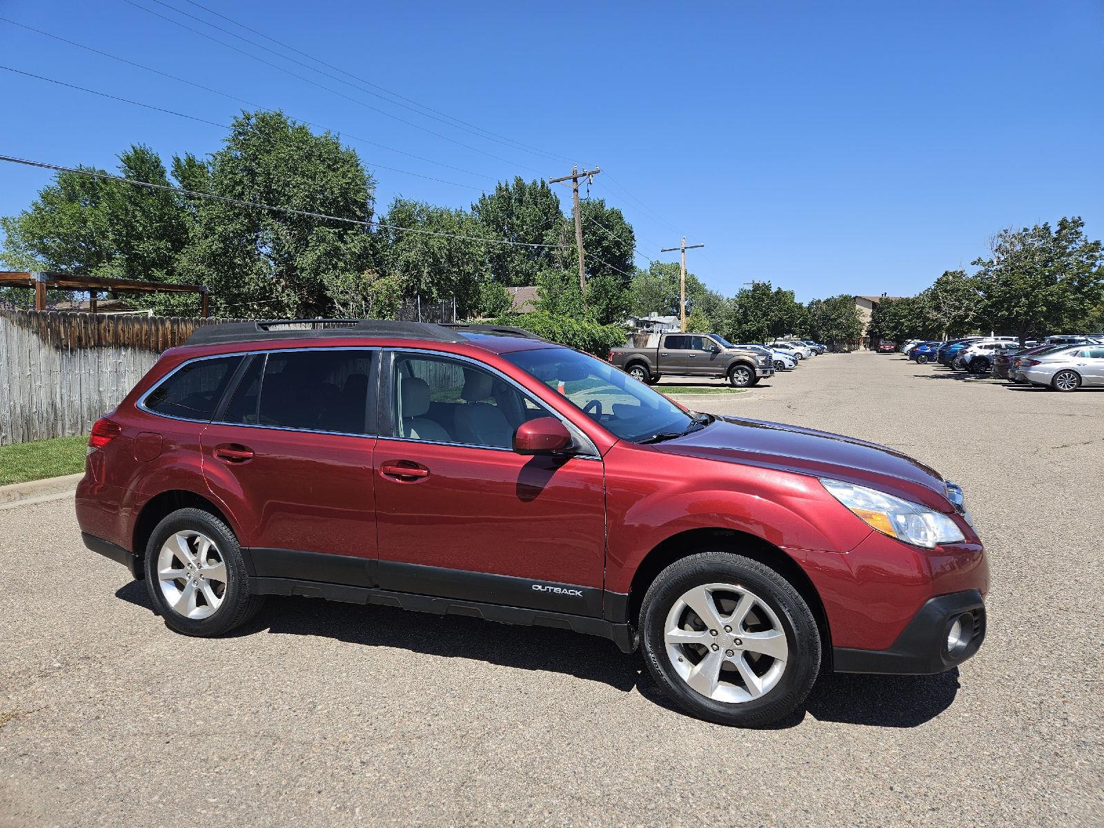 Used 2014 Subaru Outback 2.5i Limited with VIN 4S4BRBLC7E3285572 for sale in Pueblo, CO