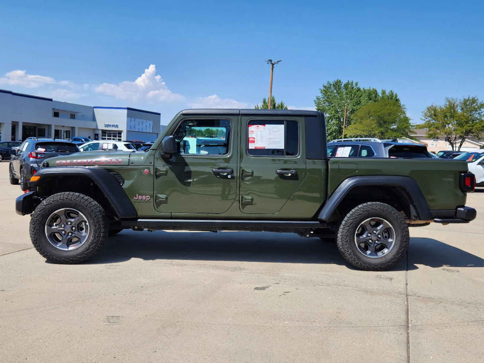 Used 2023 Jeep Gladiator Rubicon with VIN 1C6JJTBG2PL524411 for sale in Pueblo, CO