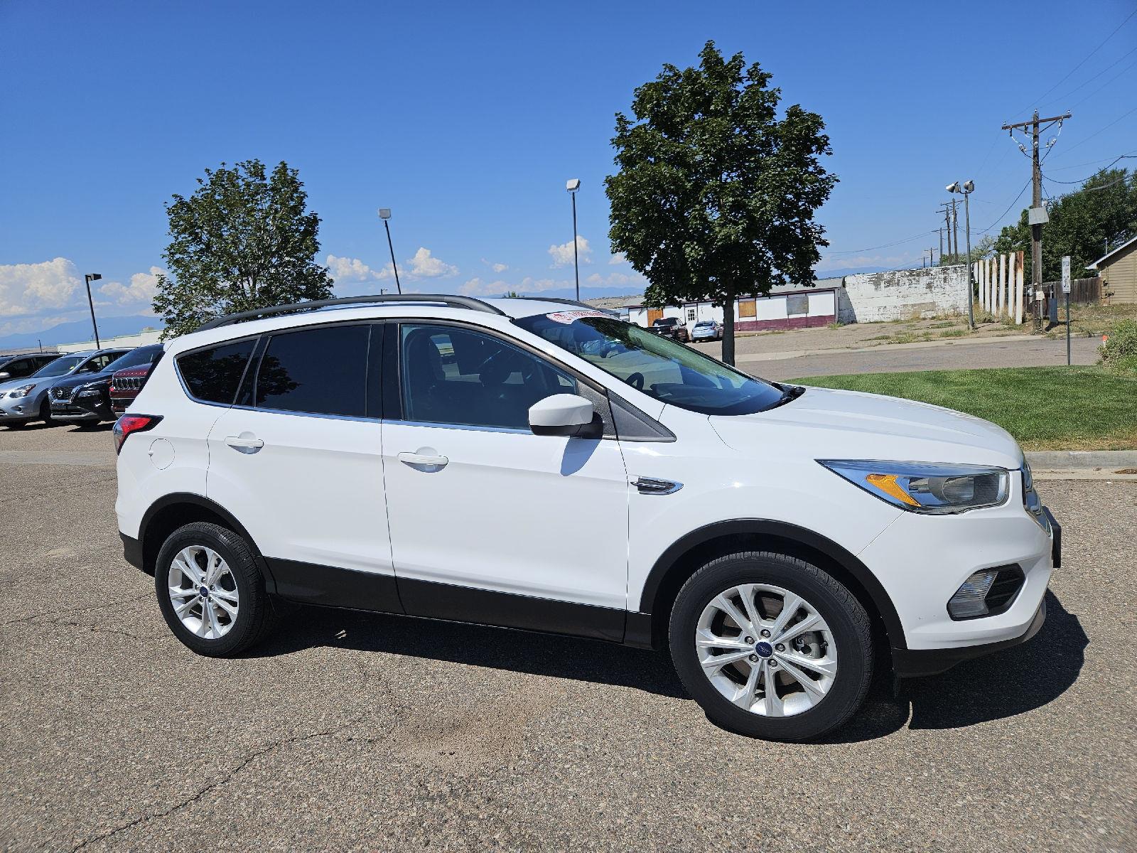 Used 2018 Ford Escape SE with VIN 1FMCU9GDXJUA97566 for sale in Pueblo, CO